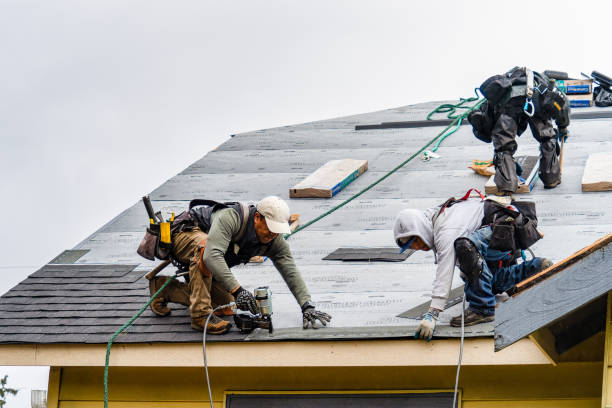 Professional Roofing technician working in Pownal, ME